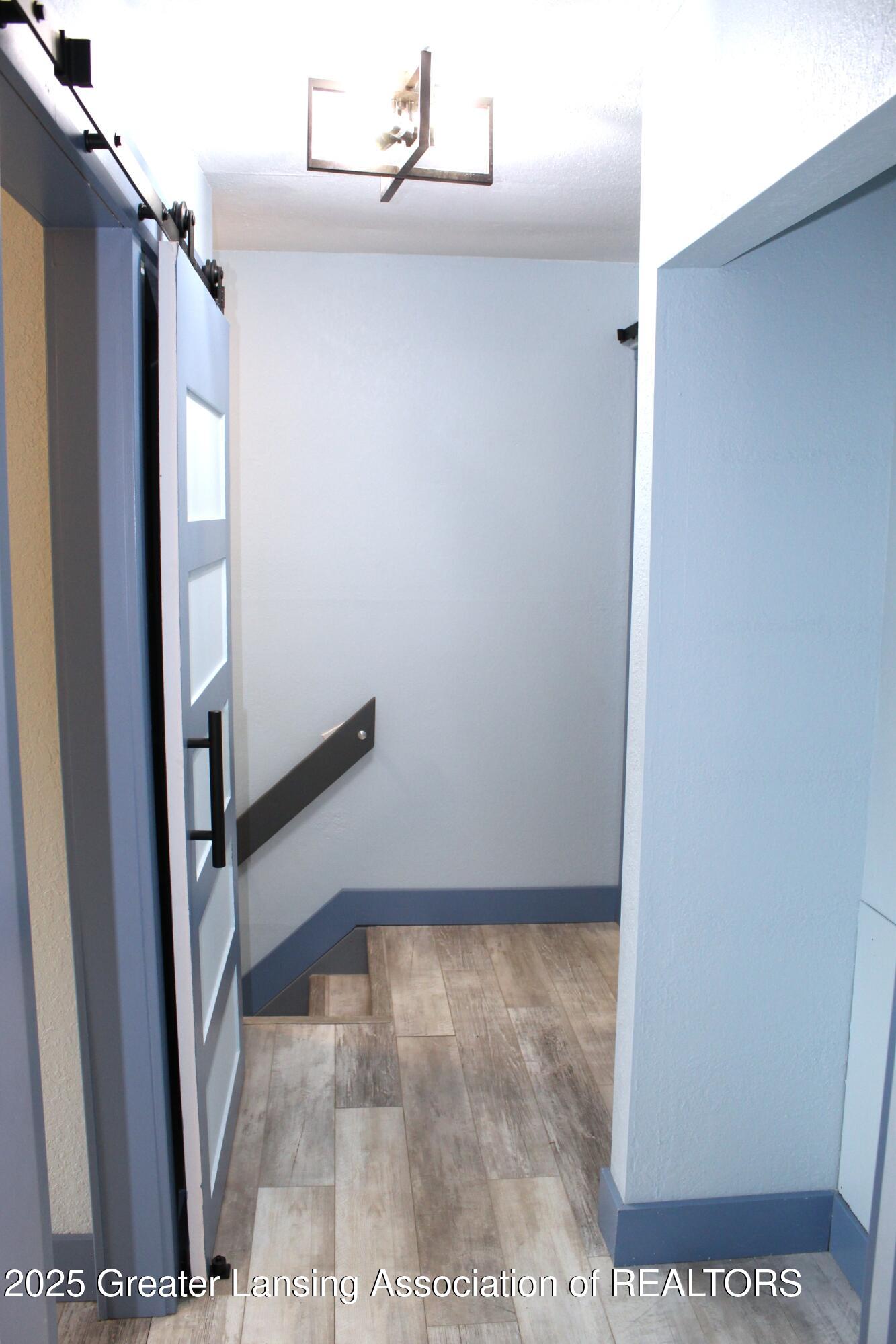 3922 Hunters Ridge Drive, Unit 3 Lansing, MI 48911 - Photo 27 of 44 hallway w/closet