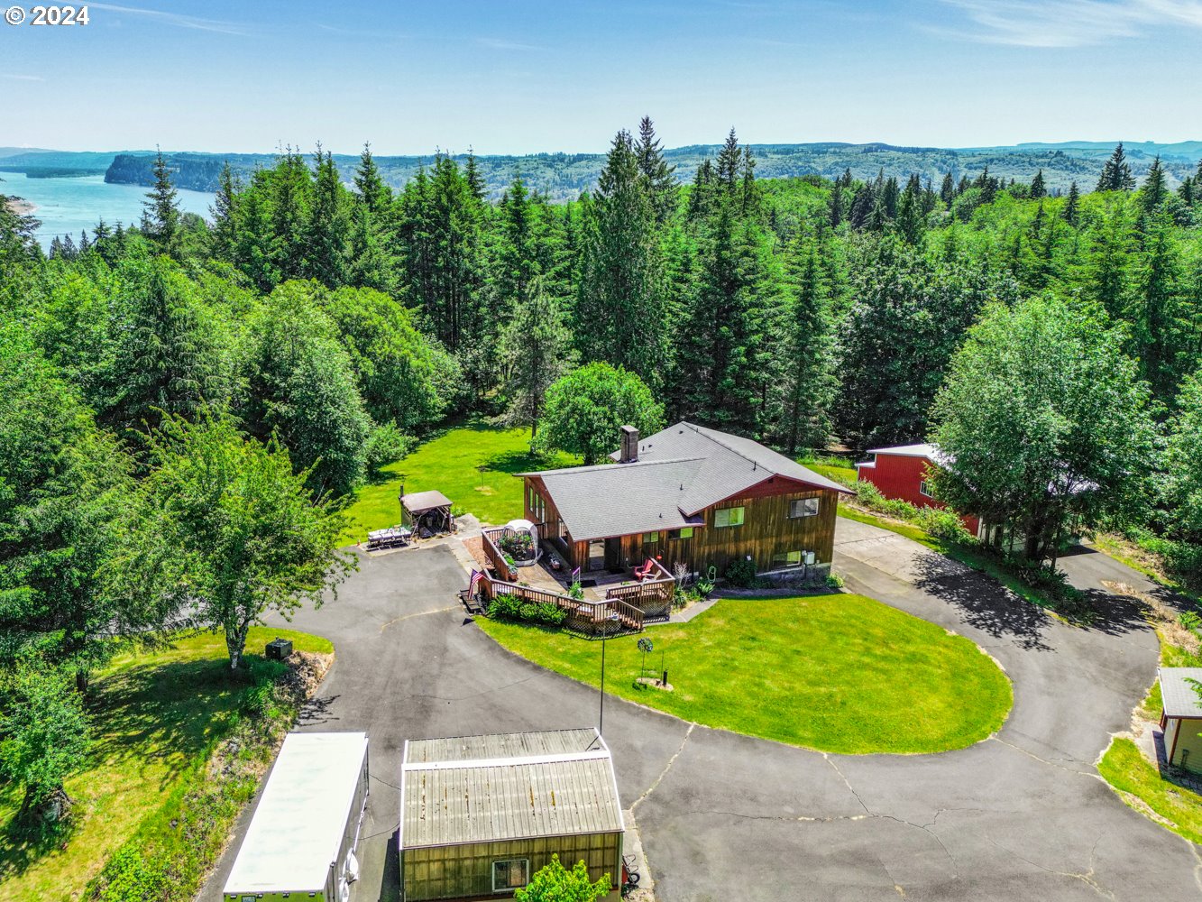 295 McAdams Road East Longview, WA 98632 - Photo 2 of 34 an aerial view of a house with garden space and street view