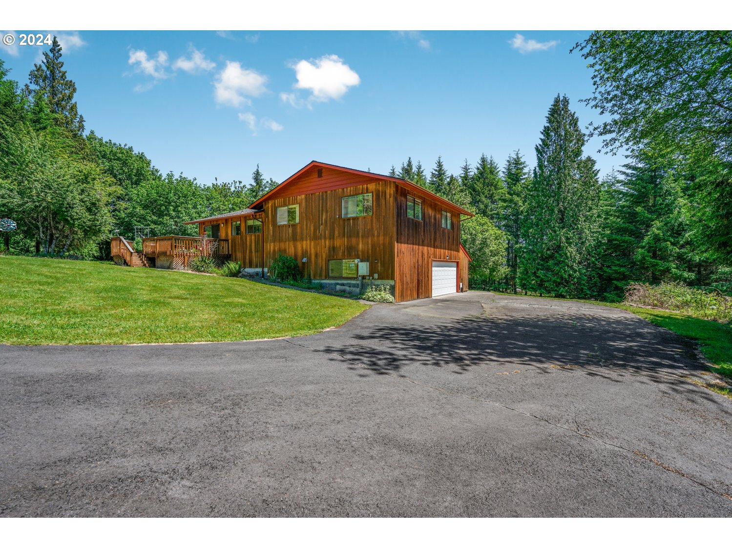 295 McAdams Road East Longview, WA 98632 - Photo 26 of 34 a view of a house with a yard