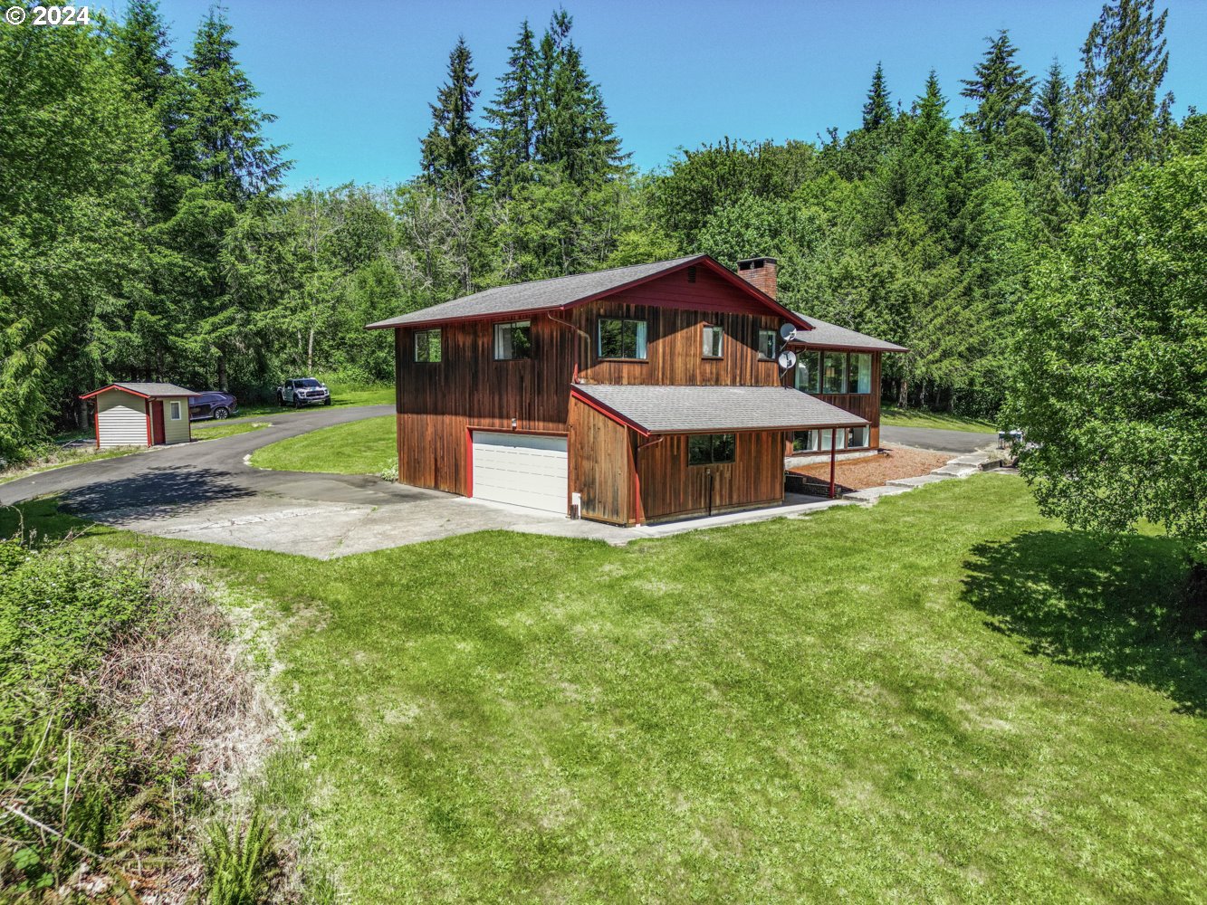 295 McAdams Road East Longview, WA 98632 - Photo 27 of 34 a front view of a house with garden