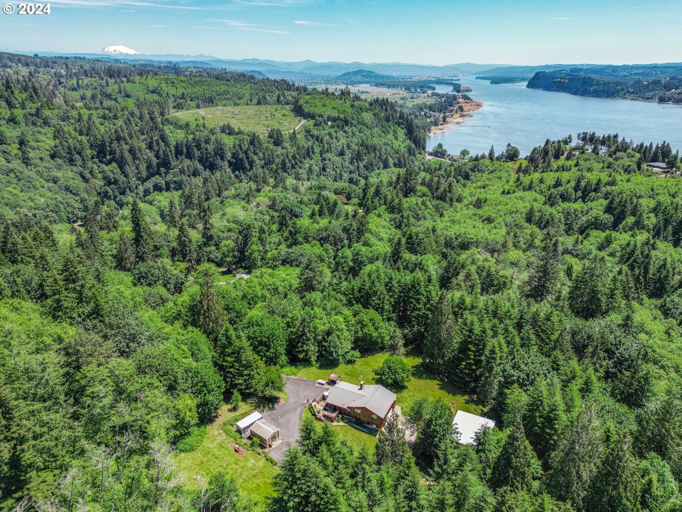 295 McAdams Road East Longview, WA 98632 - Photo 3 of 34 an aerial view of a house with a yard