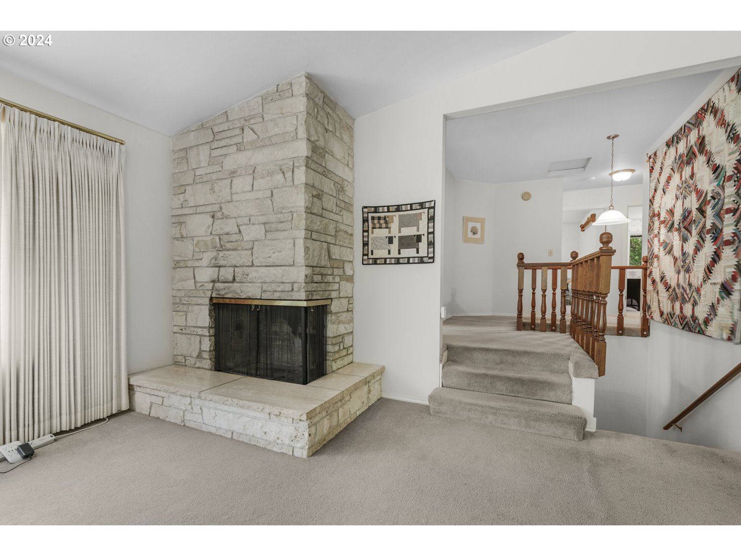 295 McAdams Road East Longview, WA 98632 - Photo 7 of 34 a living room with furniture and a fireplace