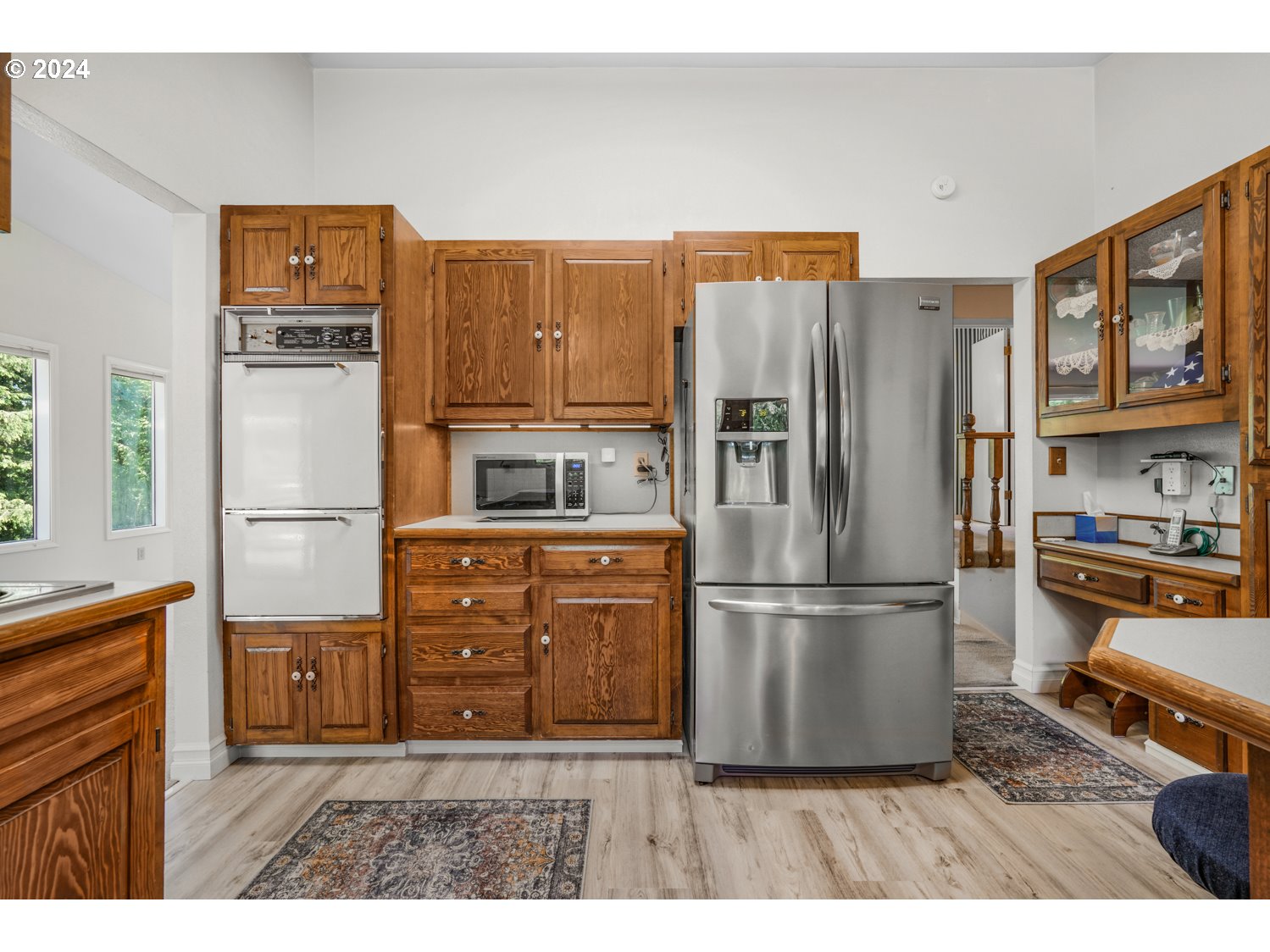 295 McAdams Road East Longview, WA 98632 - Photo 10 of 34 a kitchen with stainless steel appliances a refrigerator and a stove