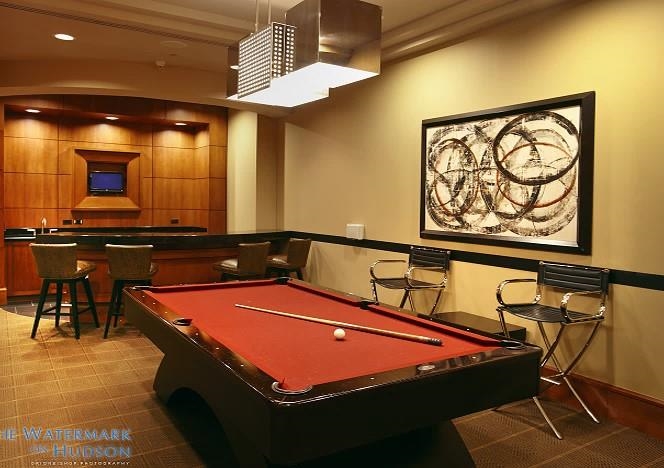 8100 River Road, Unit 810 North Bergen, NJ 07047 - Photo 20 of 20 a room with pool table and wall paintings