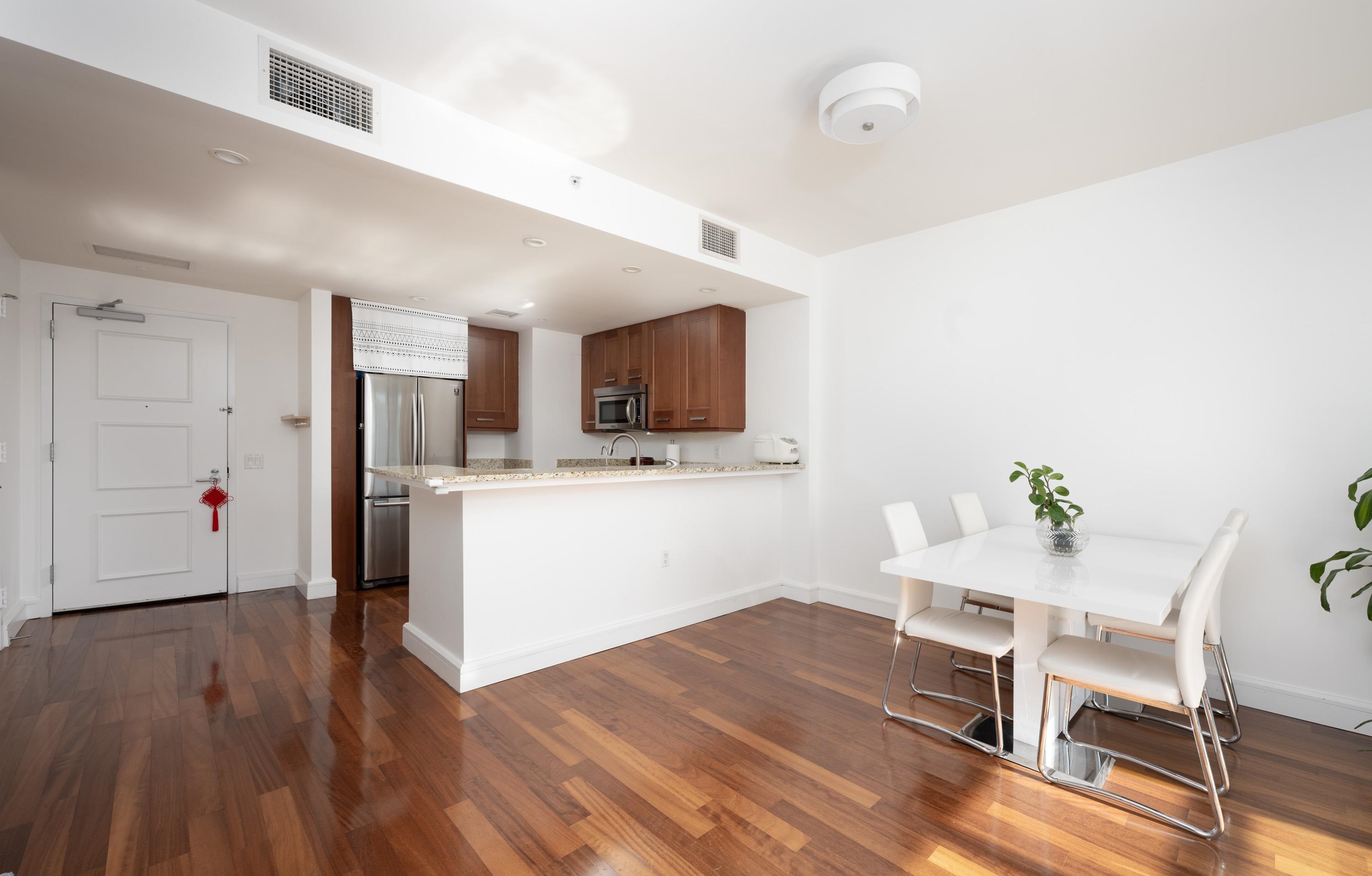 8100 River Road, Unit 810 North Bergen, NJ 07047 - Photo 8 of 20 a living room with furniture and a wooden floor