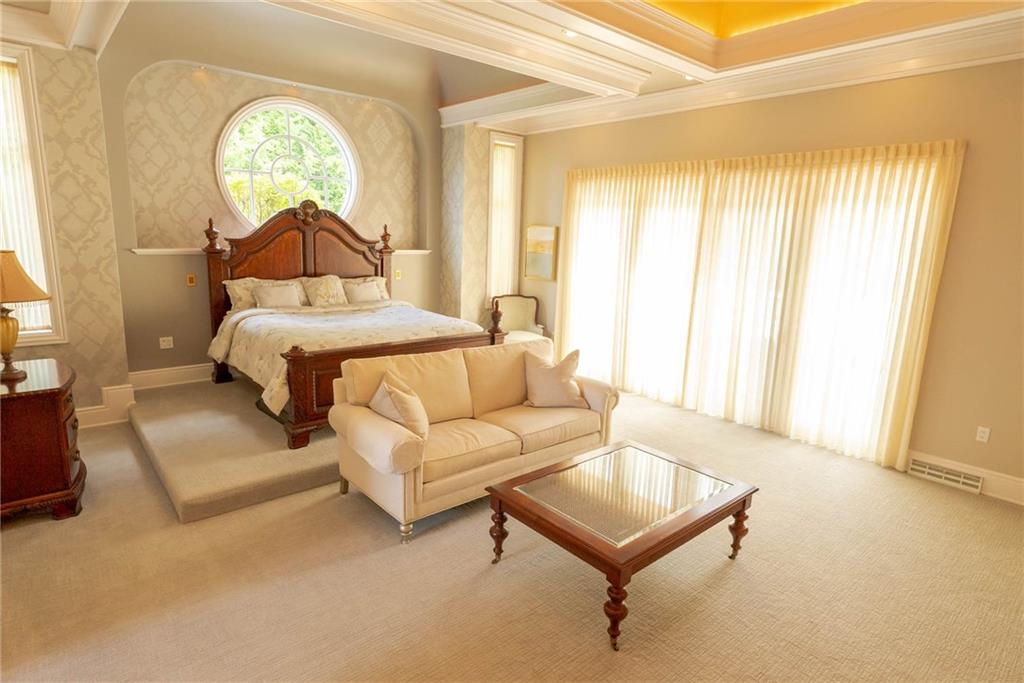 245 Saunders Station Road Trafford, PA 15085 - Photo 11 of 25 a bedroom with a bed and a window