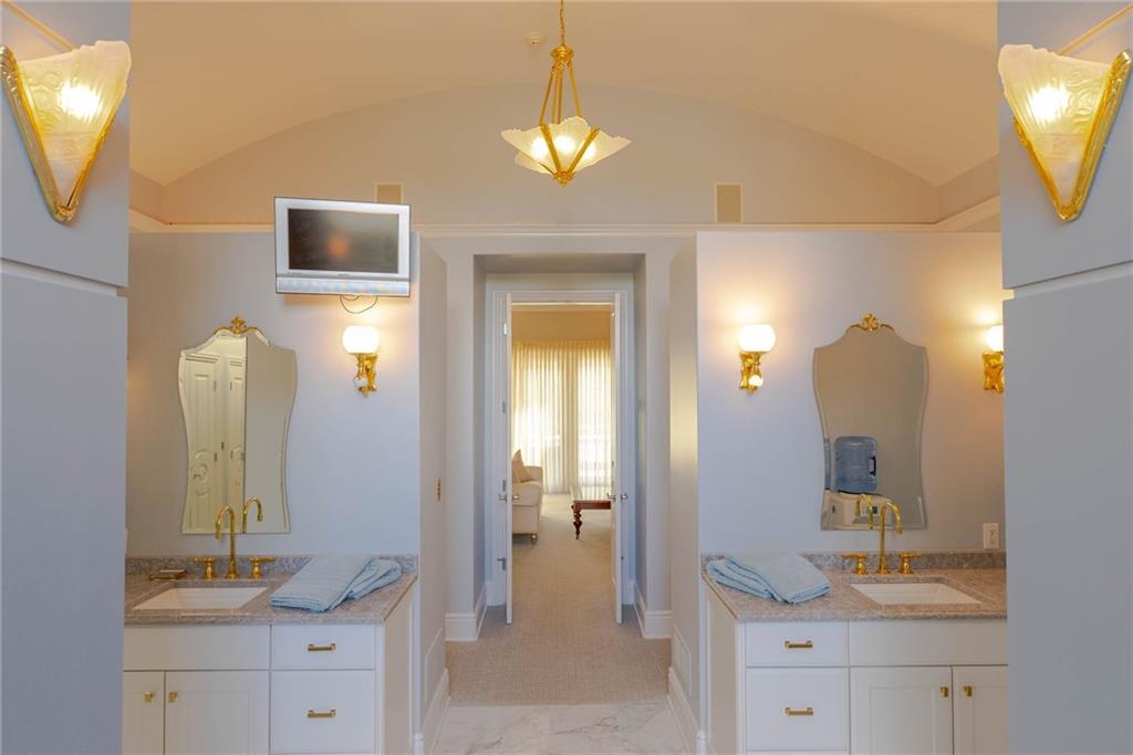 245 Saunders Station Road Trafford, PA 15085 - Photo 12 of 25 a en suite bathroom with a sink and a mirror