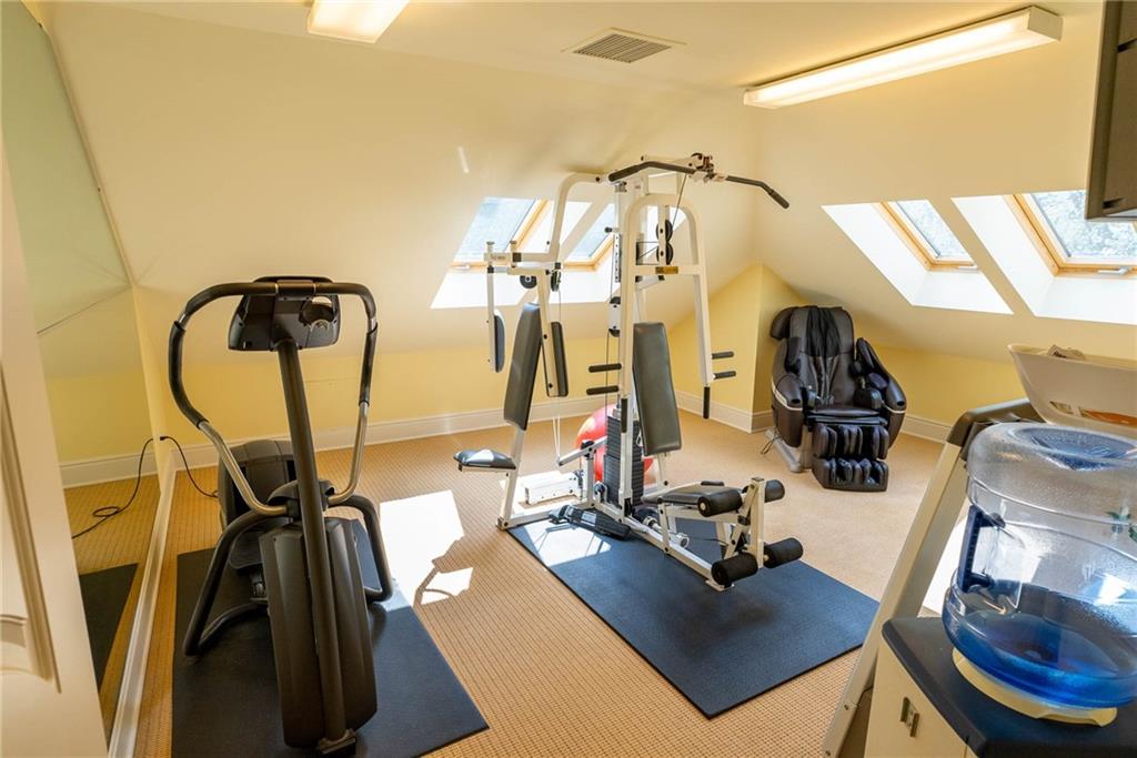 245 Saunders Station Road Trafford, PA 15085 - Photo 16 of 25 a view of a room with gym equipment