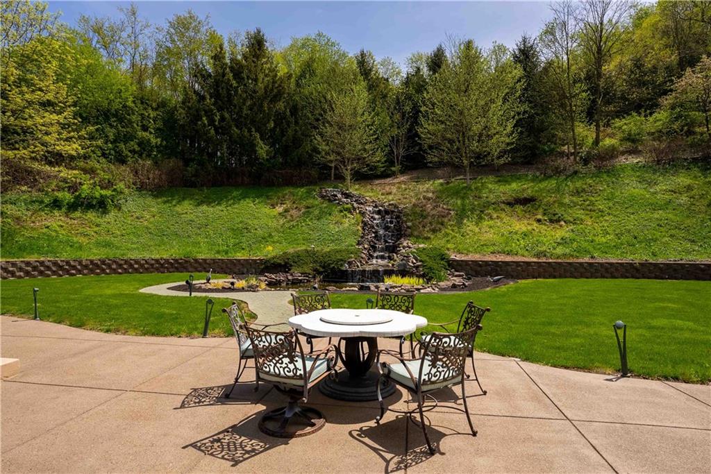 245 Saunders Station Road Trafford, PA 15085 - Photo 25 of 25 a view of a chairs and table on the garden