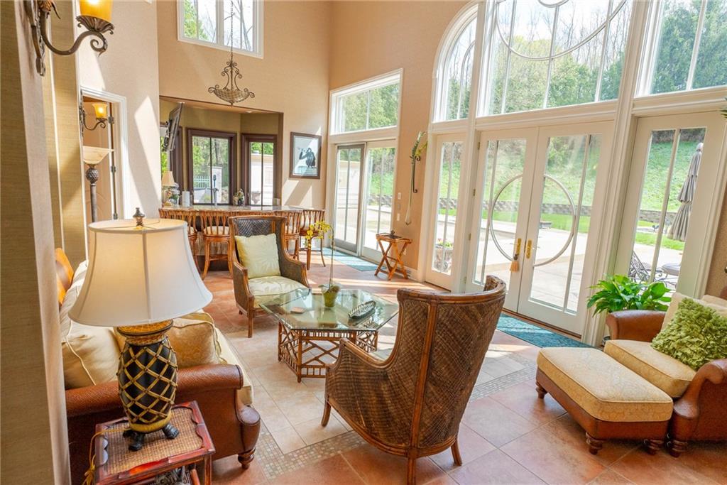 245 Saunders Station Road Trafford, PA 15085 - Photo 9 of 25 a living room with furniture and a large window