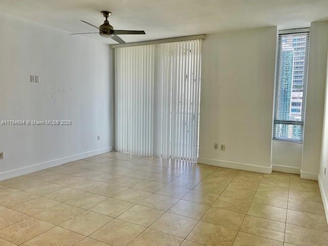 1050 Brickell Avenue, Unit 1602 Miami, FL 33131 - Photo 11 of 21 a view of an empty room with a window