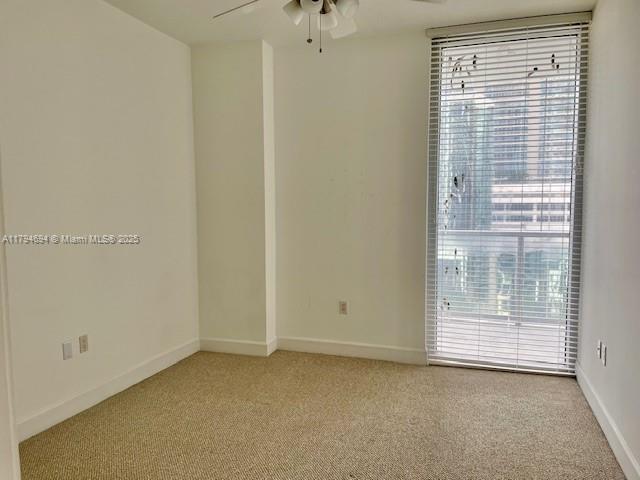 1050 Brickell Avenue, Unit 1602 Miami, FL 33131 - Photo 19 of 21 a view of an empty room with a window