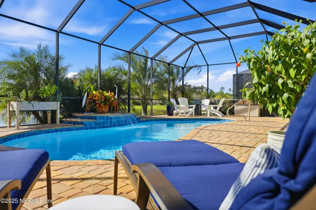 a view of an outdoor sitting area with furniture