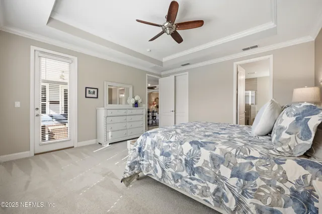 a bedroom with a bed and a cabinets