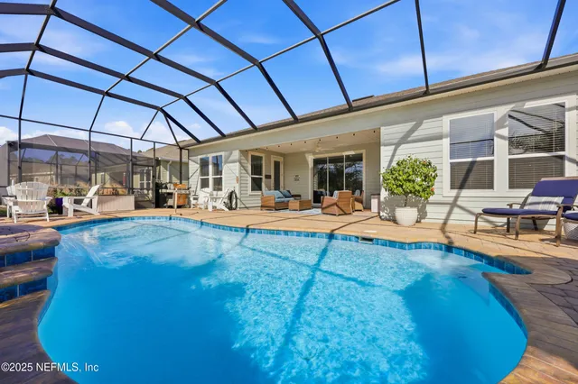 an aerial view of a house with a garden