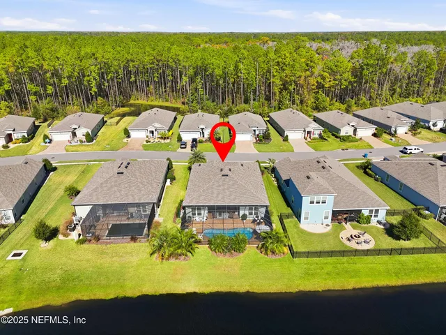 a front view of a building with small garden