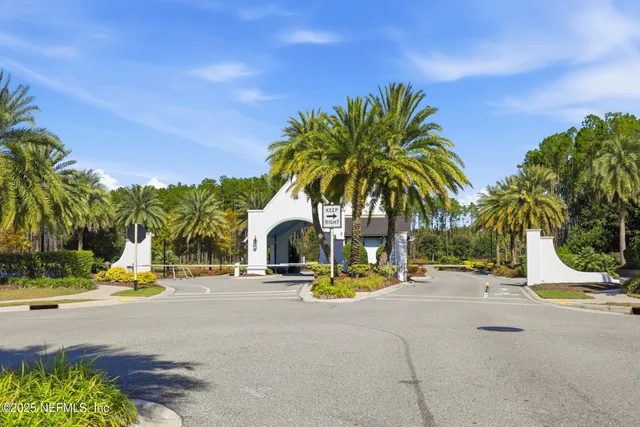 an aerial view of residential house with outdoor space and swimming pool