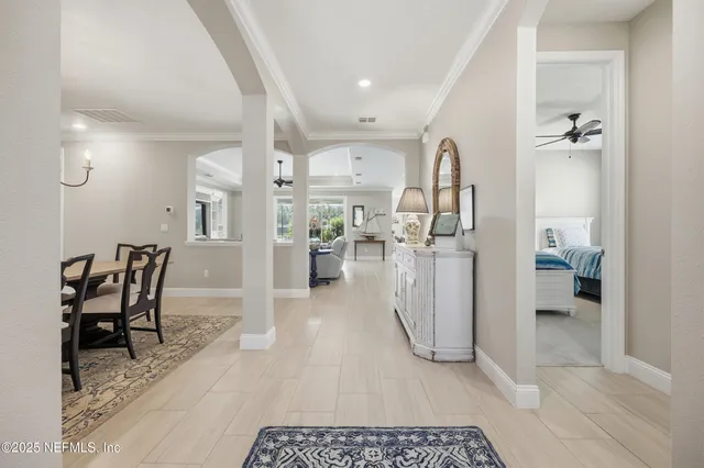 a view of a kitchen and dining room