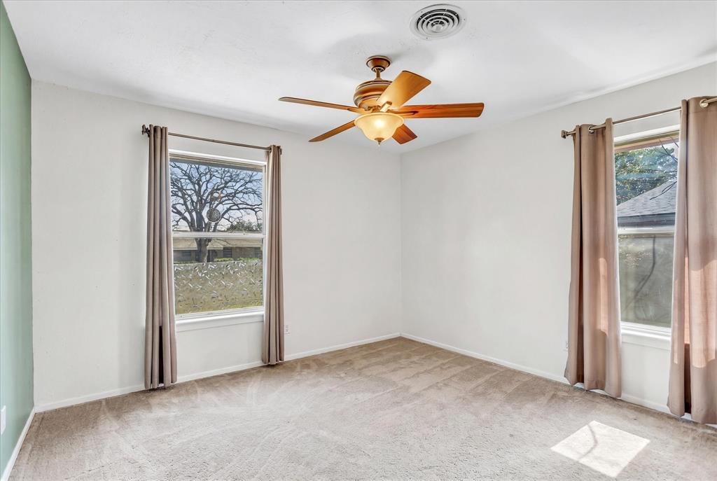 709 Hurstview Drive Hurst, TX 76053 - Photo 16 of 28 a view of empty room with window