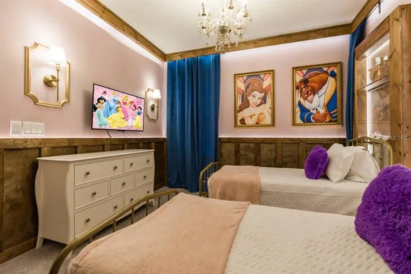 a bedroom with a bed and a cabinet