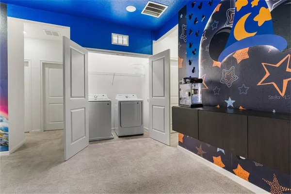 a view of a room with cabinets