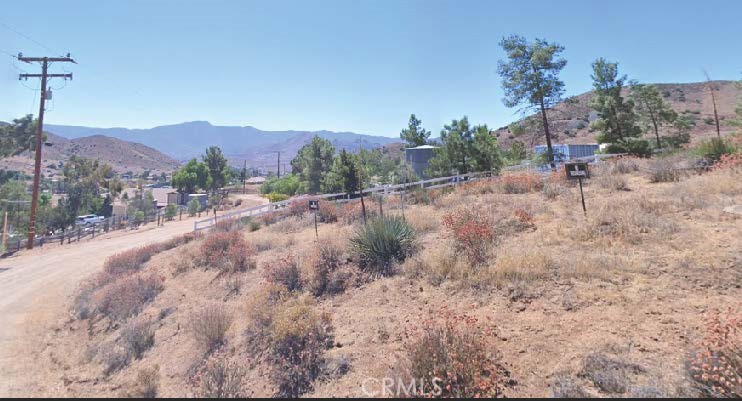 34801 Garlock Road Acton, CA 93510 - Photo 1 of 1 a view of a dry yard with mountains