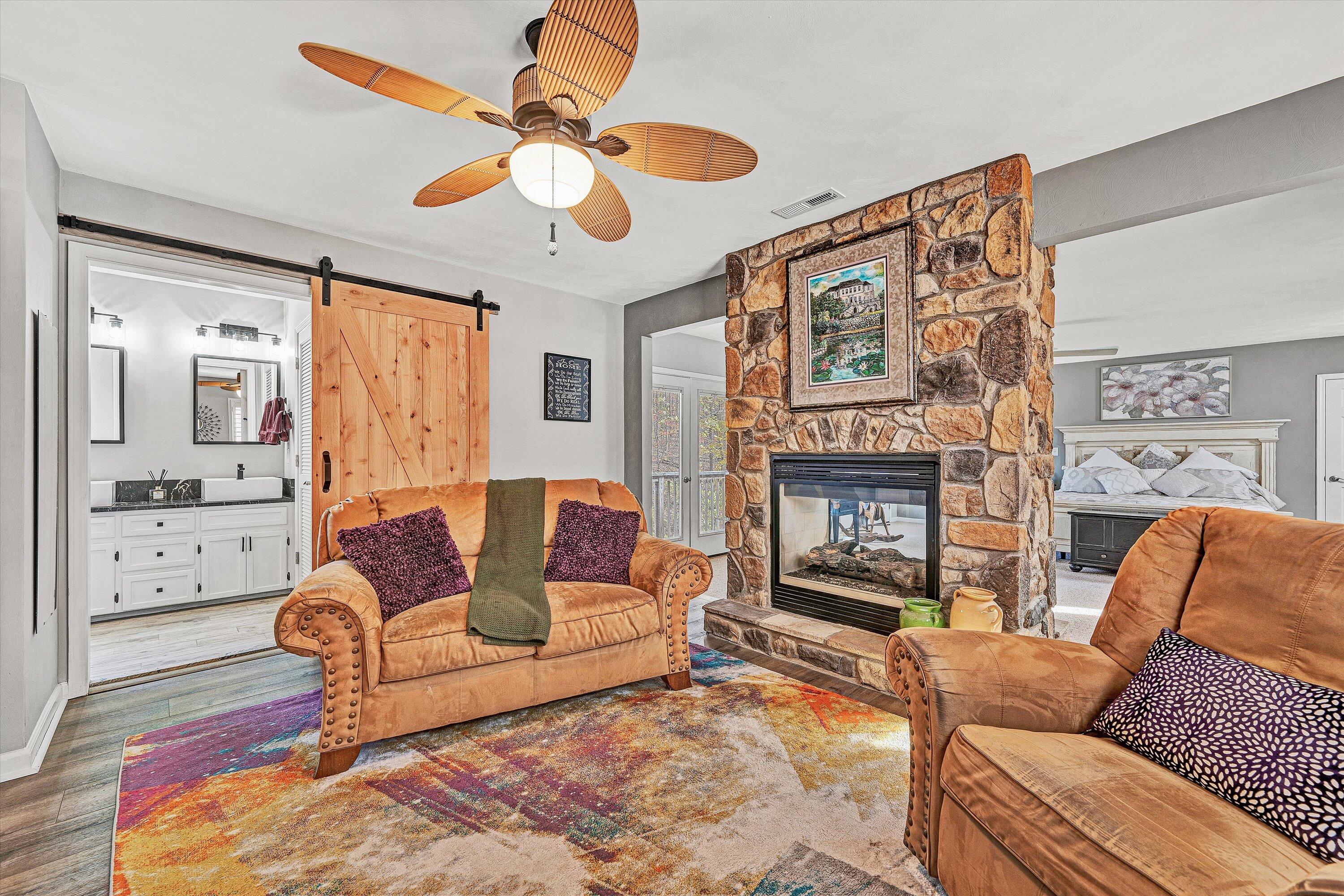 36 York Street Roanoke, VA 24019 - Photo 11 of 90 a living room with furniture a fireplace and a flat screen tv