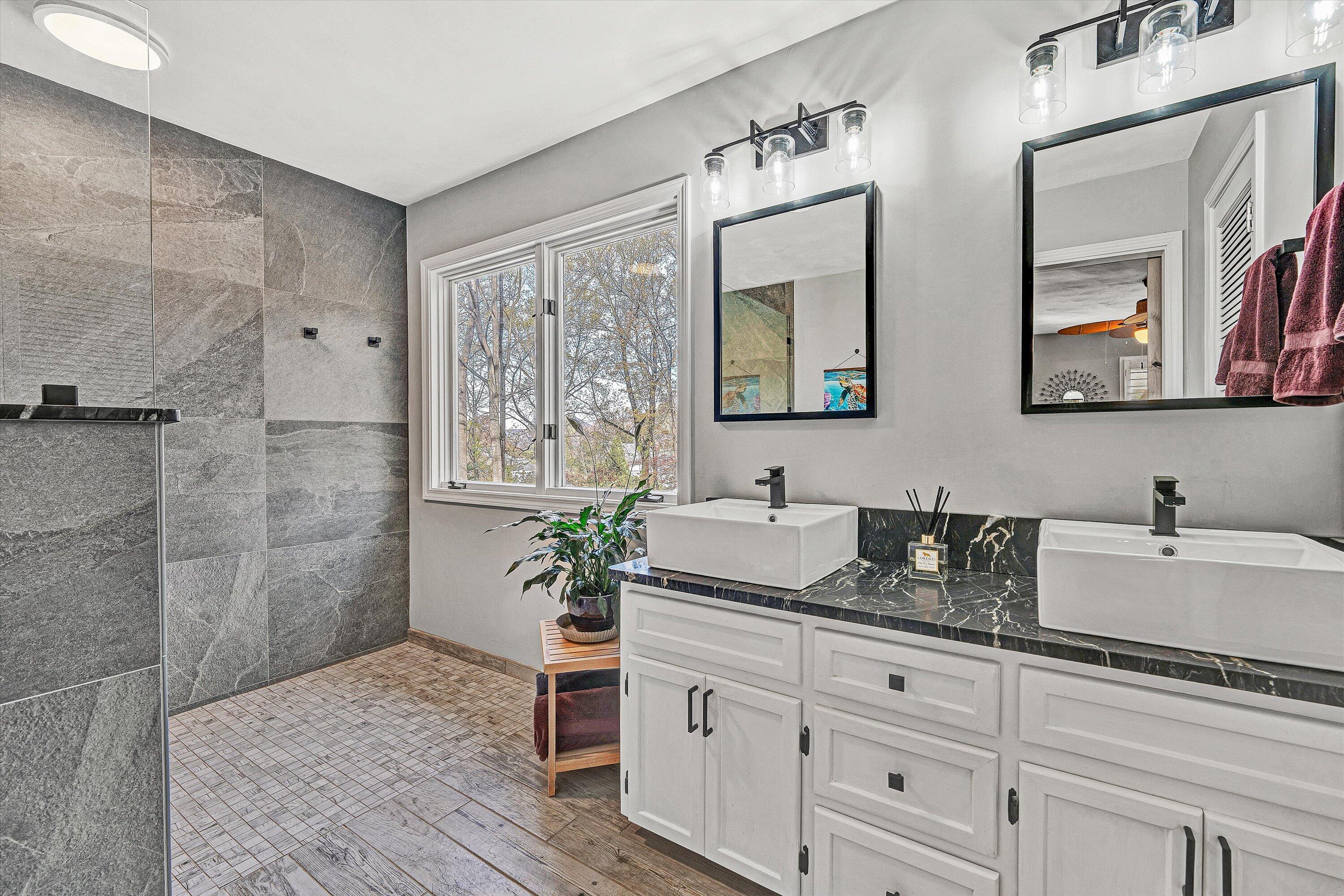 36 York Street Roanoke, VA 24019 - Photo 24 of 90 a bathroom with double vanity and a mirror