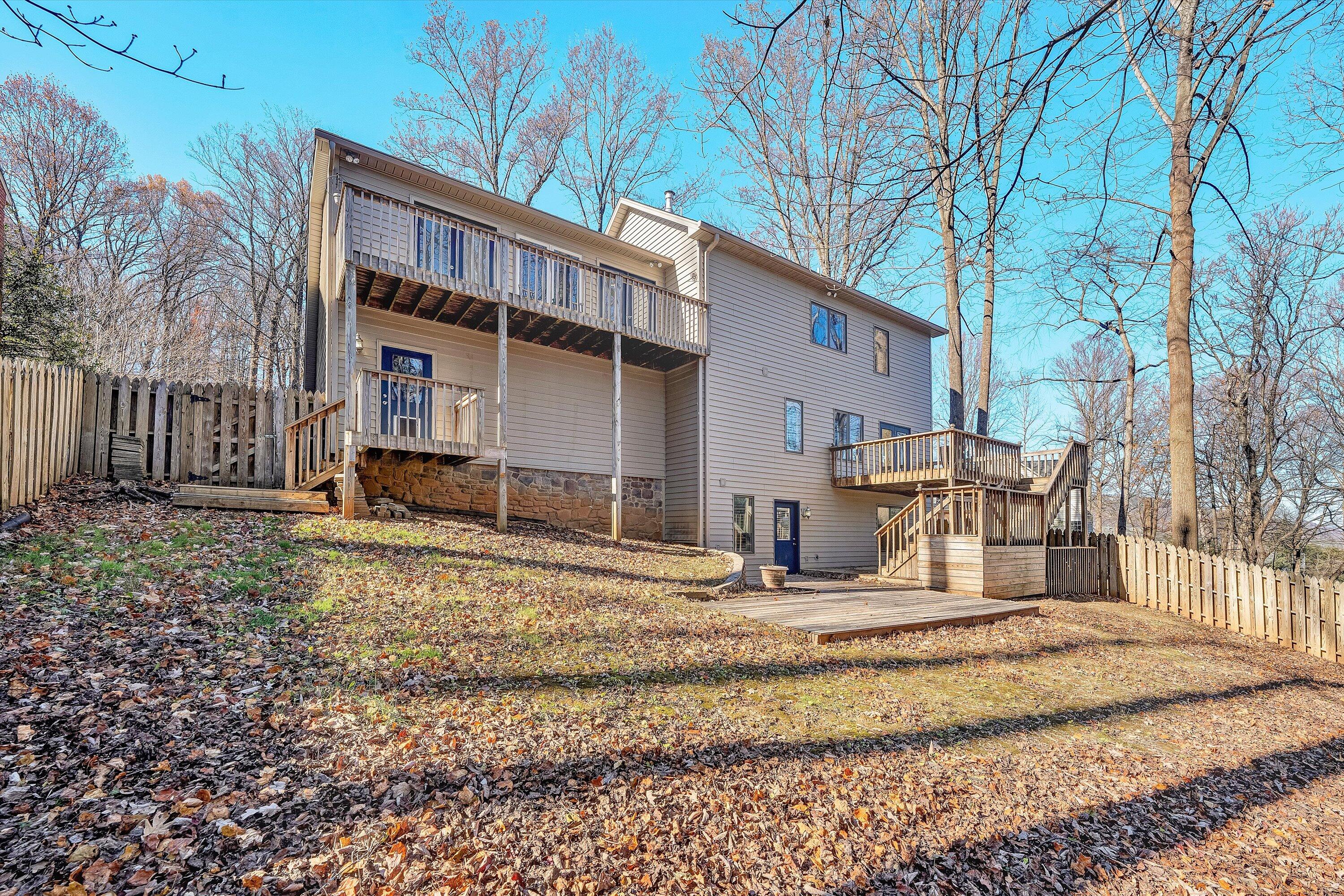36 York Street Roanoke, VA 24019 - Photo 59 of 90 a view of a house with a yard patio and fire pit