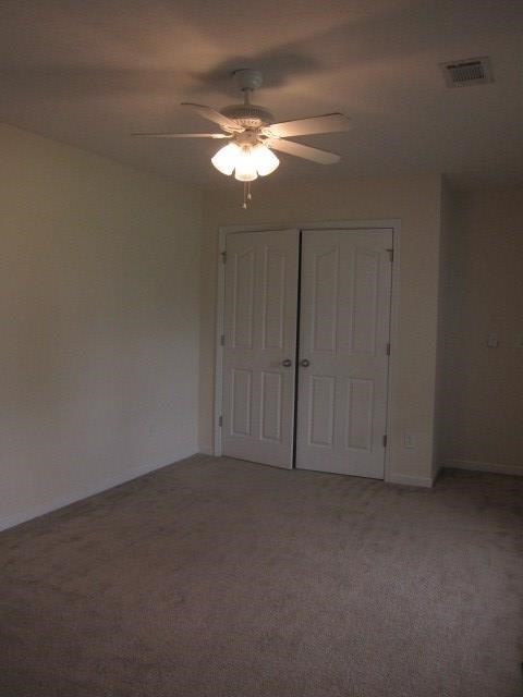 162 Owens Road Fort Mitchell, AL 36856 - Photo 11 of 13 a view of an empty room with a chandelier fan