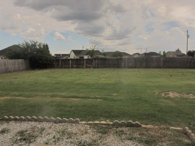 162 Owens Road Fort Mitchell, AL 36856 - Photo 12 of 13 a view of a field with an trees in the background
