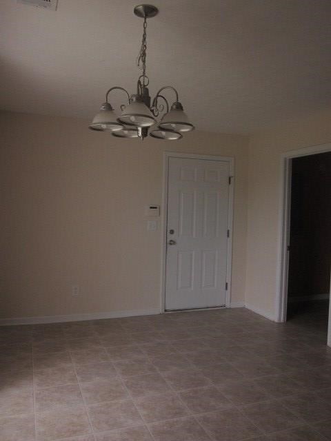 162 Owens Road Fort Mitchell, AL 36856 - Photo 3 of 13 a view of a room with a chandelier fan