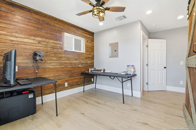 a view of a workspace with furniture