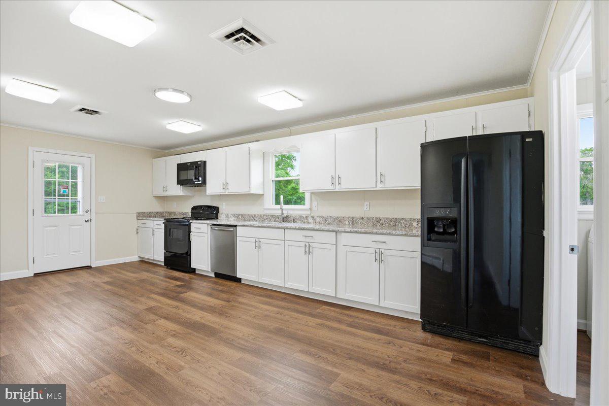 38125 Louis Thomas Road Avenue, MD 20609 - Photo 17 of 73 KITCHEN LVP FLOORING NEW 2026 YR