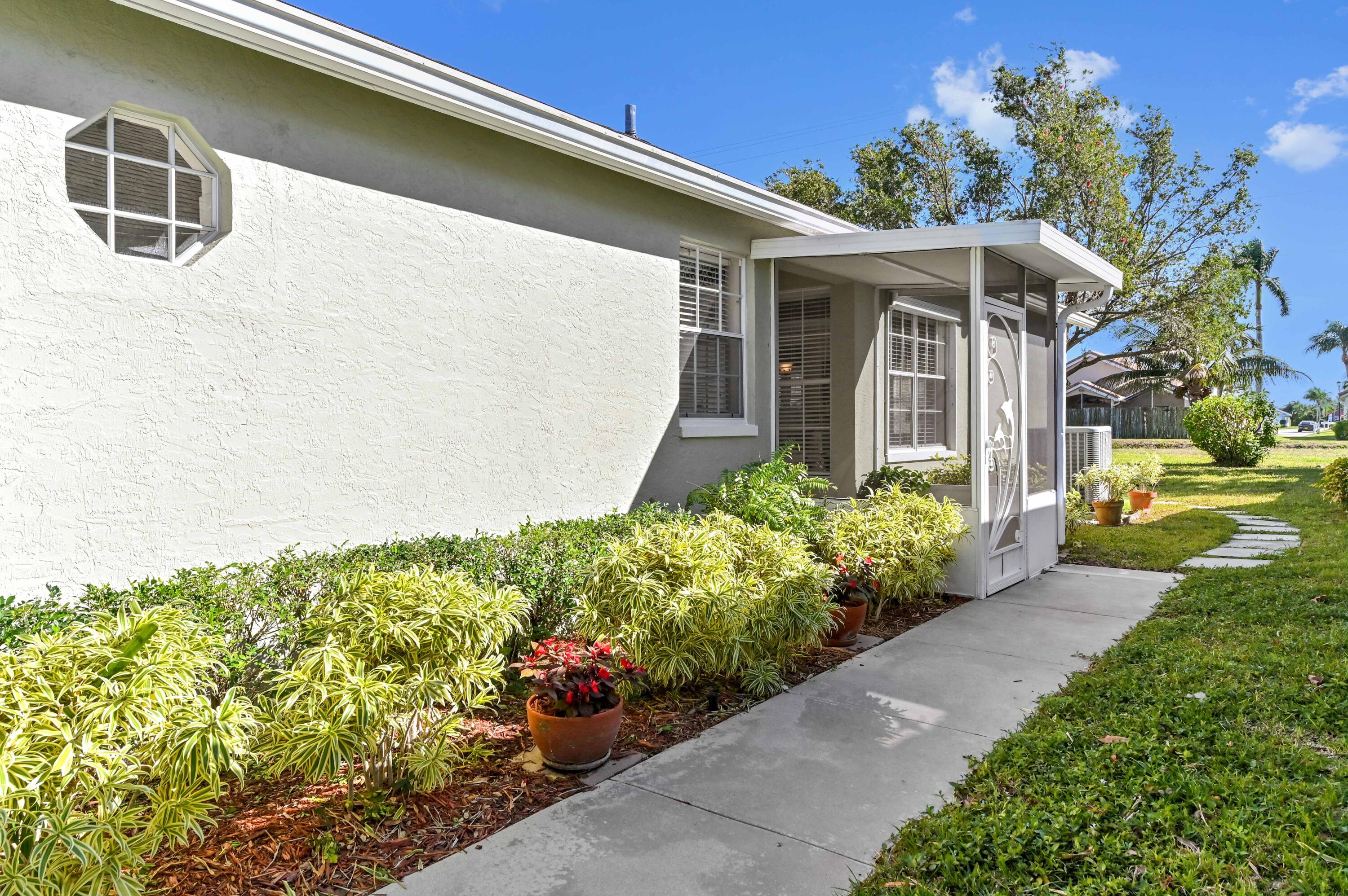 7724 Mansfield Hollow Road Delray Beach, FL 33446 - Photo 4 of 35 Front entrance walkup