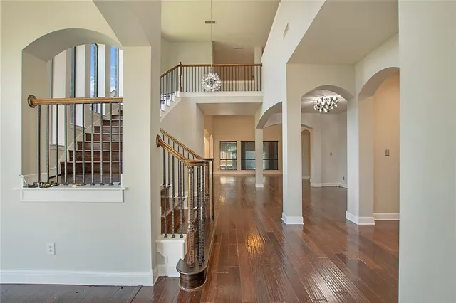 a view of entryway with wooden floor