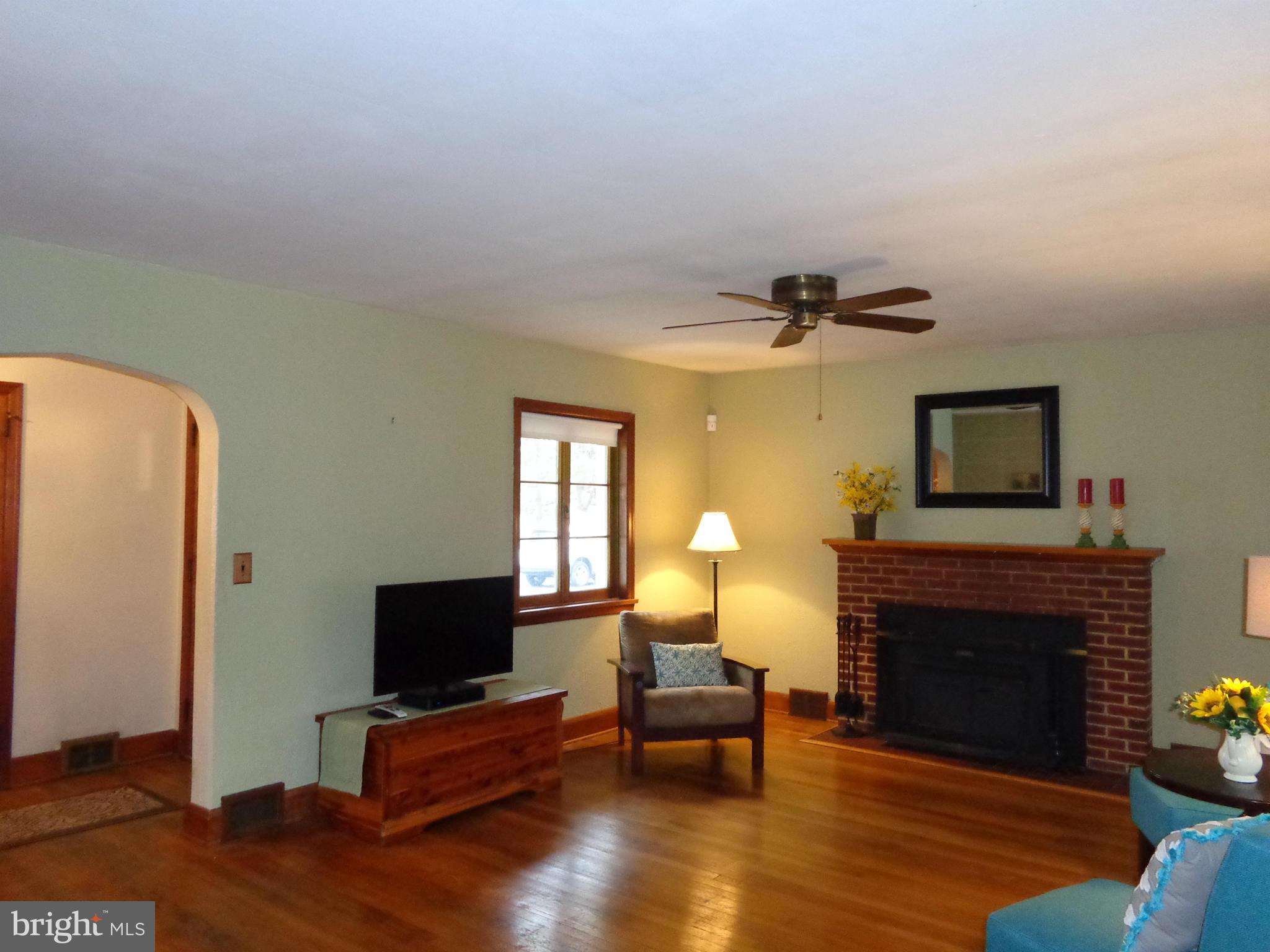 2312 Choate Road Fallston, MD 21047 - Photo 5 of 30 Living Room with wood stove insert