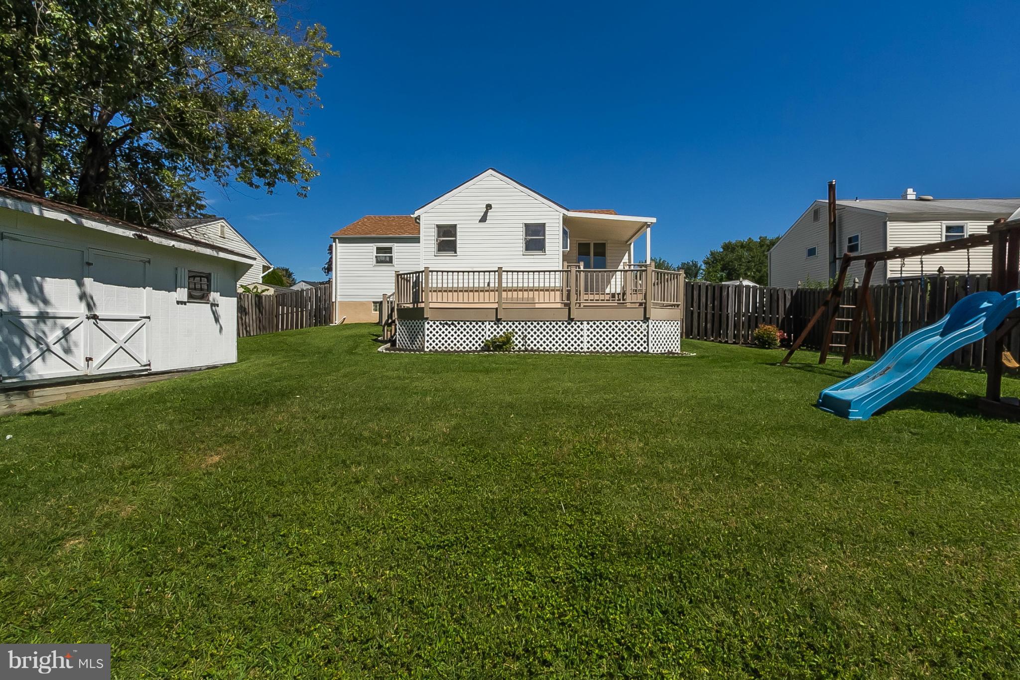 4241 4 Mills Road Baltimore, MD 21236 - Photo 17 of 25 a house with garden in front of it