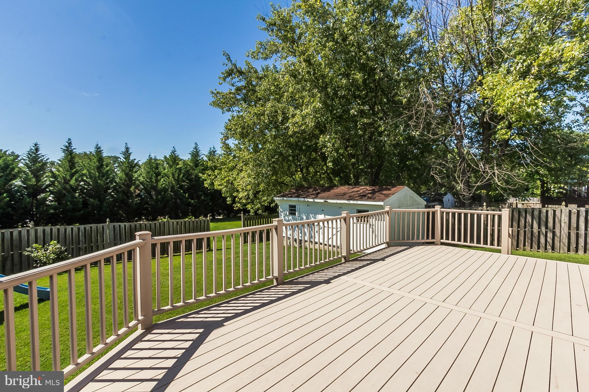 4241 4 Mills Road Baltimore, MD 21236 - Photo 19 of 25 a balcony with wooden floor and fence