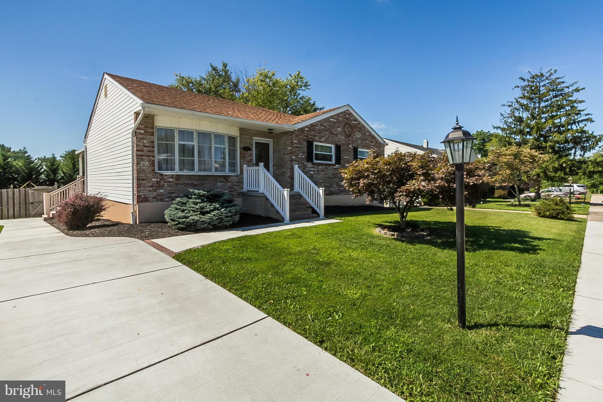 4241 4 Mills Road Baltimore, MD 21236 - Photo 25 of 25 a front view of a house with a yard