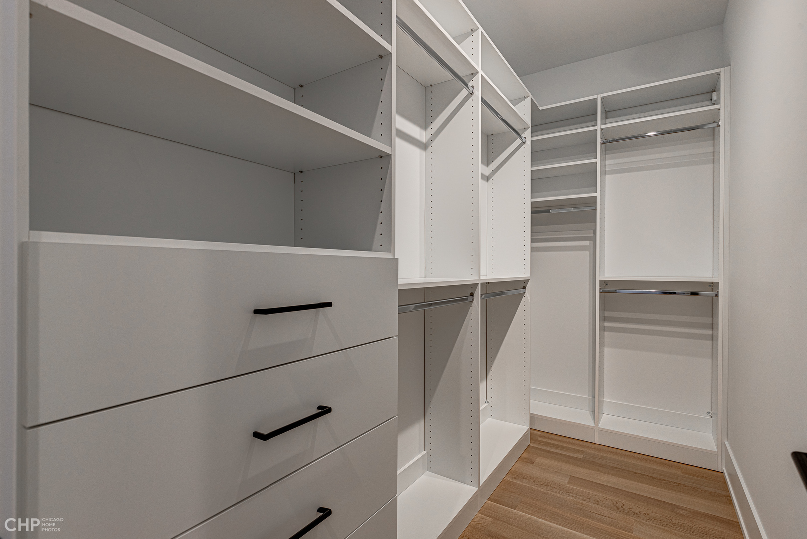 Undisclosed Address Chicago, IL 60622 - Photo 11 of 17 a view of walk in closet with empty racks