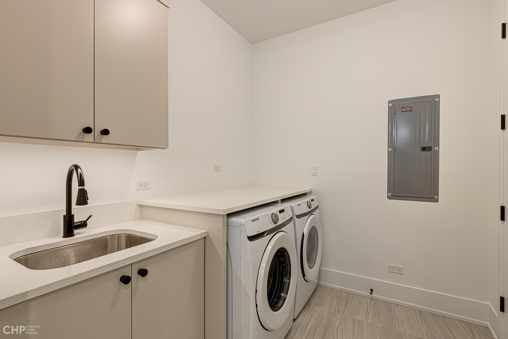 Undisclosed Address Chicago, IL 60622 - Photo 15 of 17 a view of a sink and washer dryer