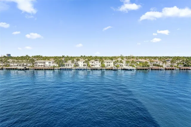 a view of city and ocean from balcony