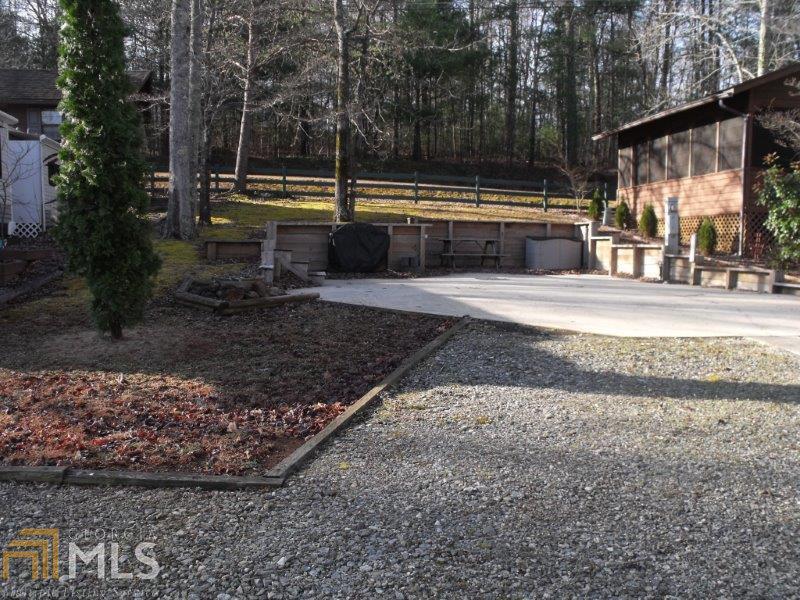 93 Hidden Valley Road, Unit 11 Cleveland, GA 30528 - Photo 1 of 1 a view of a yard with a slide