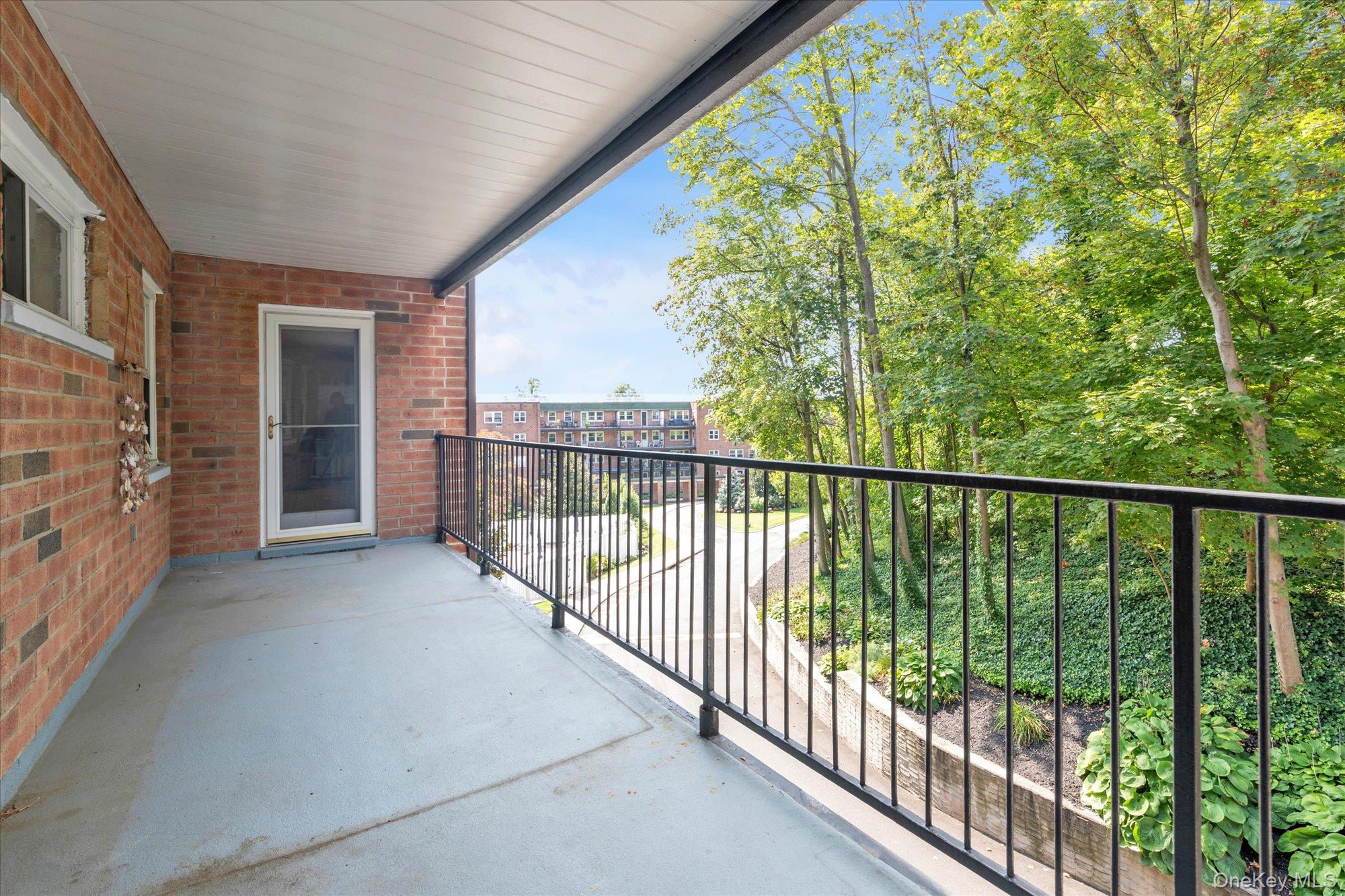 30 Pearsall Avenue, Unit 2F Glen Cove, NY 11542 - Photo 18 of 25 View of large balcony