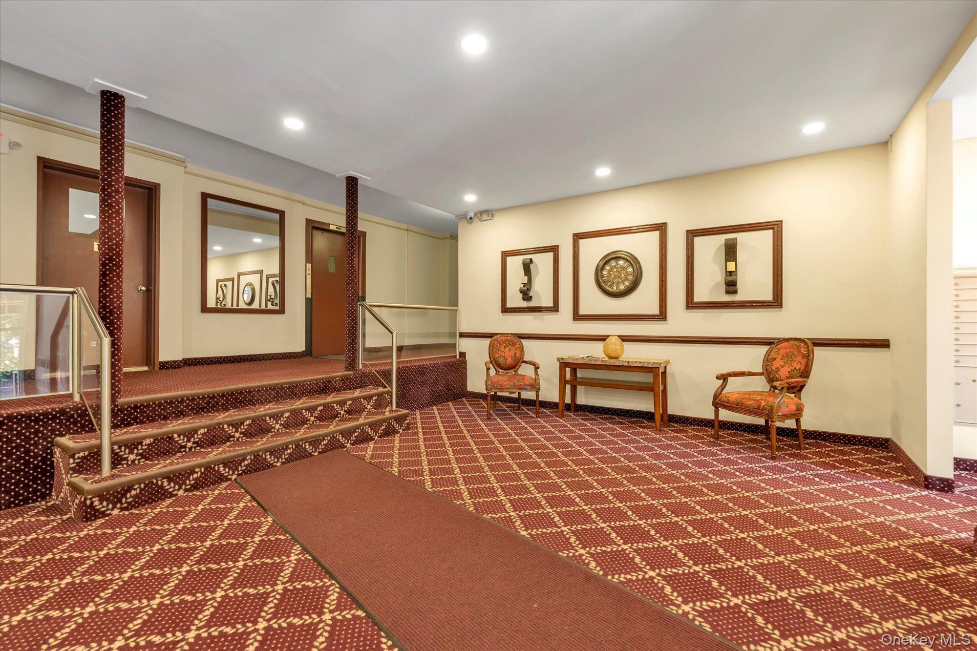 30 Pearsall Avenue, Unit 2F Glen Cove, NY 11542 - Photo 19 of 25 Community lobby with intercom system to enter and recessed lighting