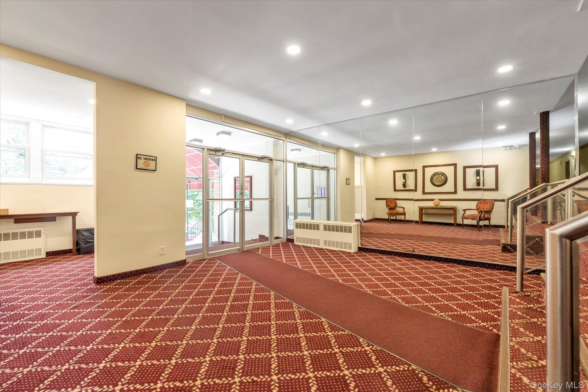 30 Pearsall Avenue, Unit 2F Glen Cove, NY 11542 - Photo 20 of 25 Building lobby with recessed lighting