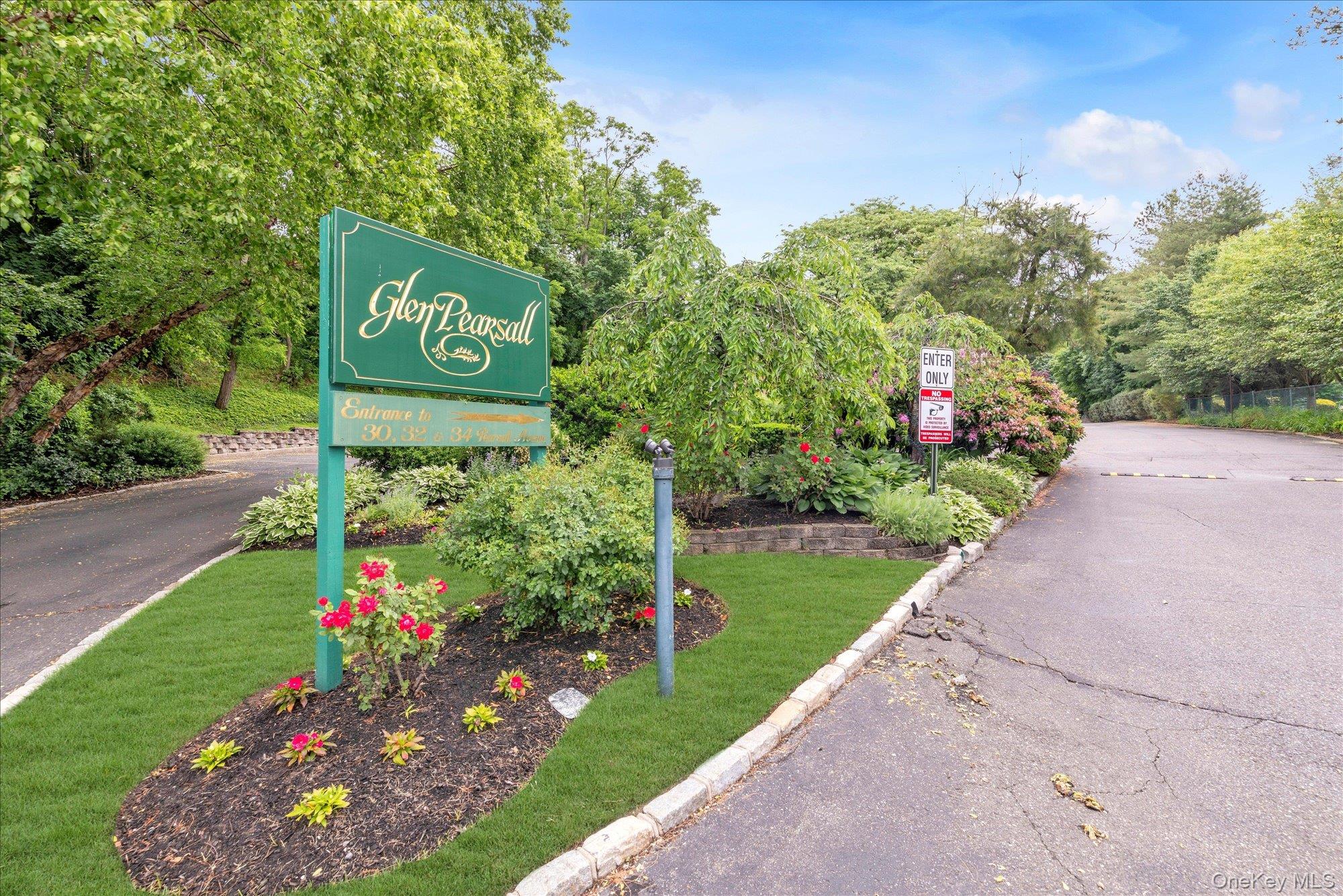 30 Pearsall Avenue, Unit 2F Glen Cove, NY 11542 - Photo 25 of 25 Exterior view. Well maintained grounds