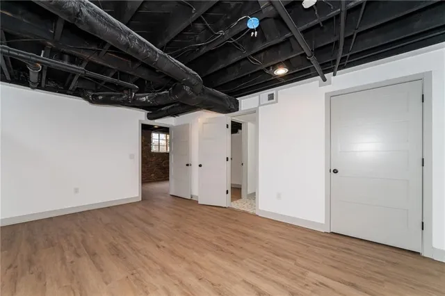 a picture of a cabinet with a white wall