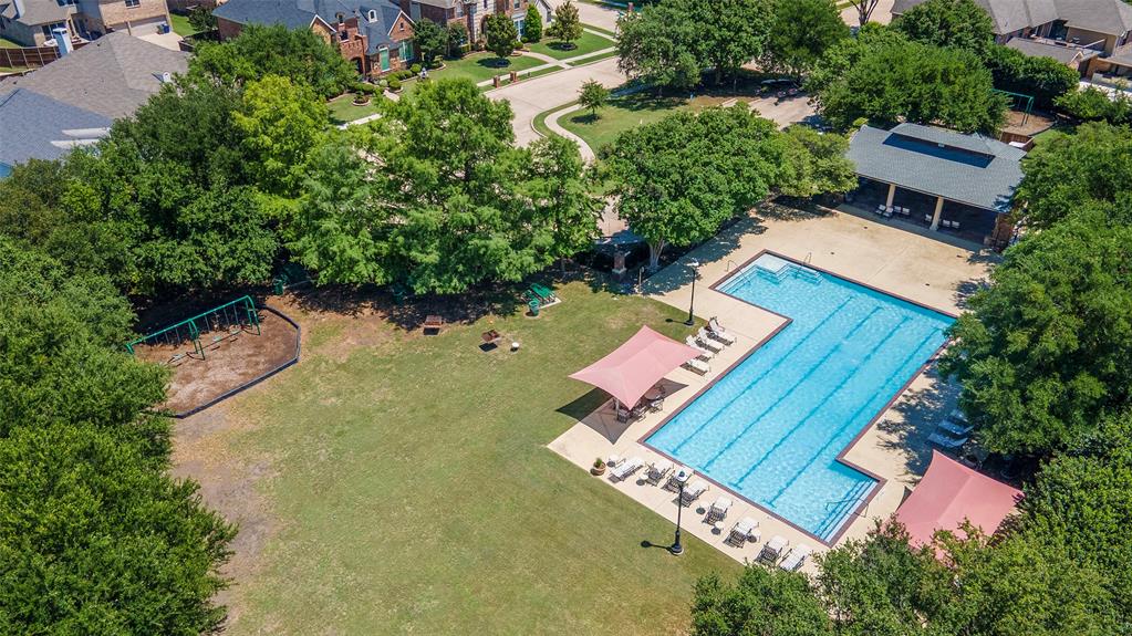 1217 Windmere Way Allen, TX 75013 - Photo 36 of 38 Resort-style community amenities invite weekends filled with swimming, shaded gatherings, playground fun, and open green space for every stage of life.